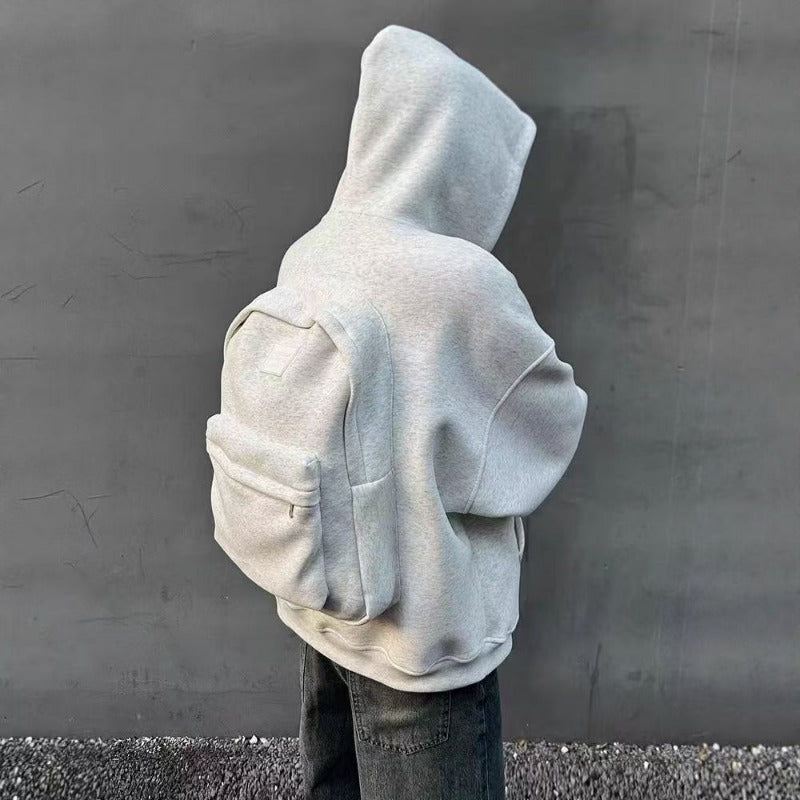 Sudadera con mochila integrada para viajes