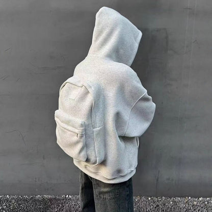 Sudadera con mochila integrada para viajes